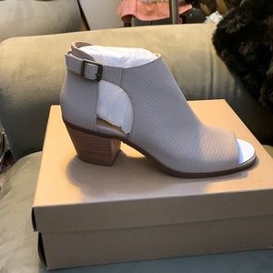 BRAND NEW beautiful peep toe bootie.